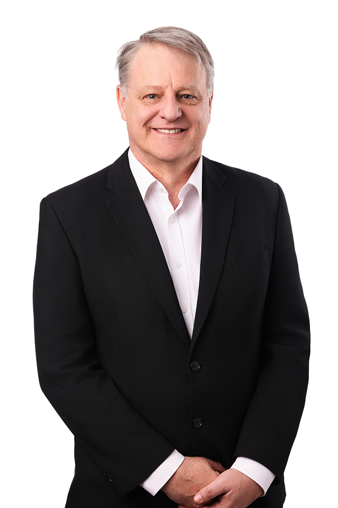 Prof. Em. Andrew Garnett